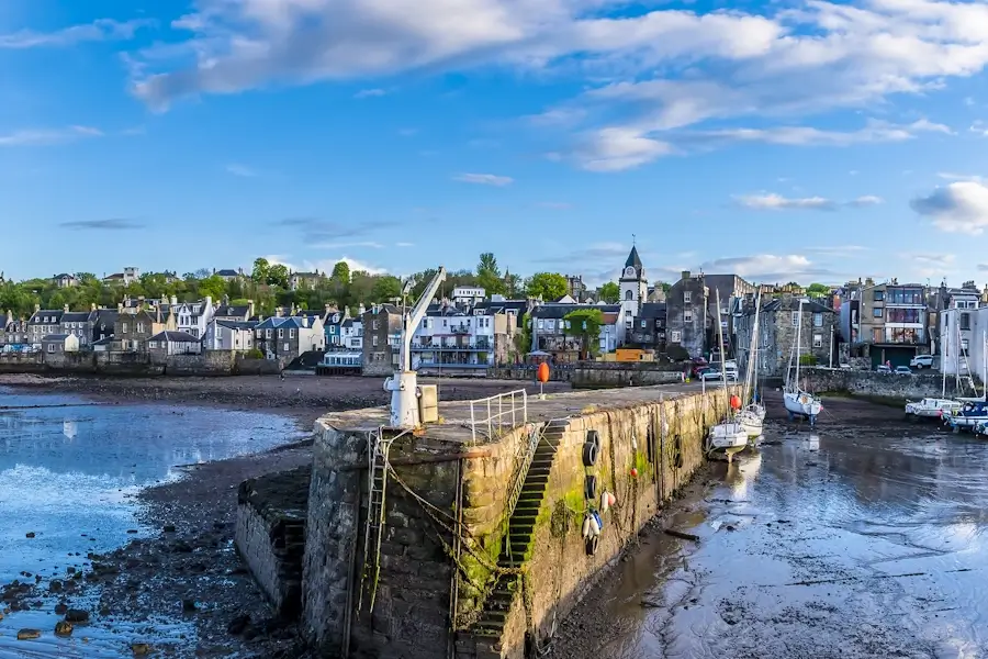 south queensferry harbour with skyline in the background