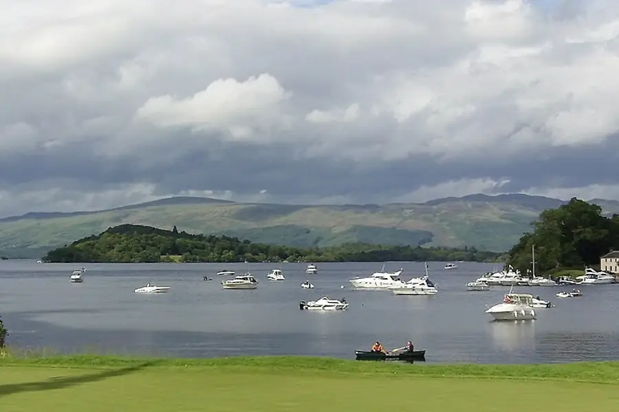 Loch Lomond with boats on the water and hills in the background near Greenock cruise port