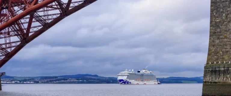 Majestic Princess anchored off South Queensferry beneath the Forth Bridge, Edinburgh cruise port arrival view