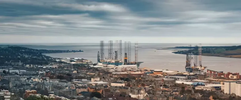 Dundee cruise port quay view with city skyline and harbour activity