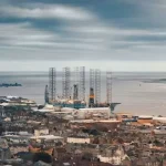 Dundee cruise port quay view with city skyline and harbour activity