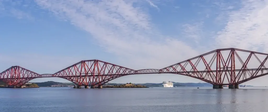 cruise ship anchored in the Firth of Forth beneath the Forth Bridge near South Queensferry Edinburgh cruise port