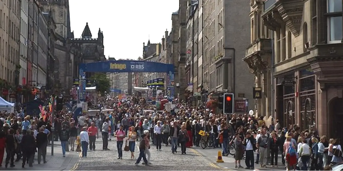 royal mile during edinburgh festival with crowds and busy streets in august